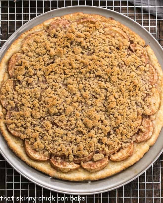 Overhead view of Apple Pie Pizza baked on a pizza pan.