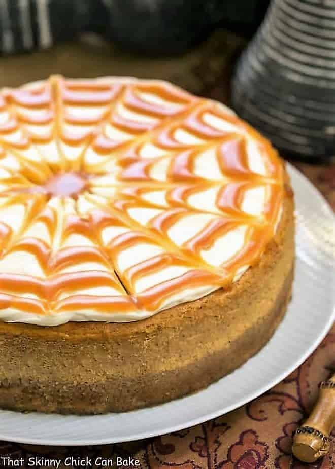 Caramel Topped Pumpkin Cheesecake on a white serving plate