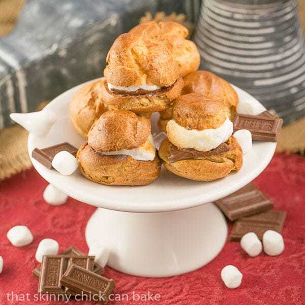 S'mores Cream Puffs stacked up on a small cake stand!