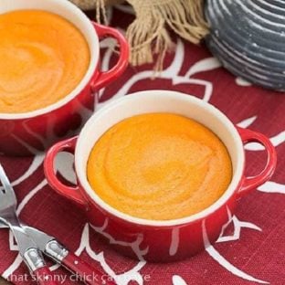 Carrot Puff in two small red baking dishes over a red and white napkin