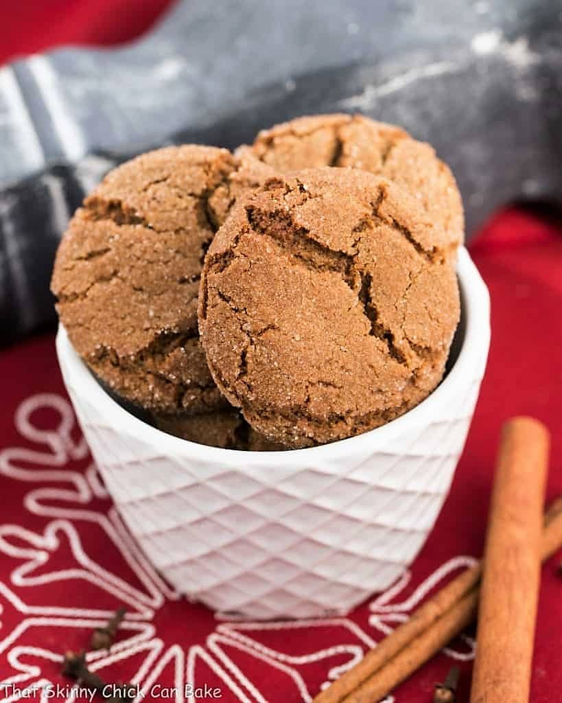 Chewy gingersnaps in a white ceramic bowl.