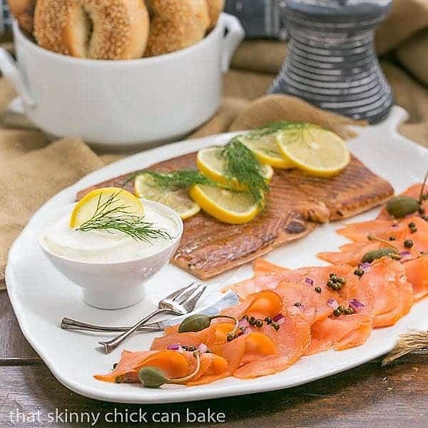 A Smoked Salmon Platter on a white, leaf shaped ceramic tray.