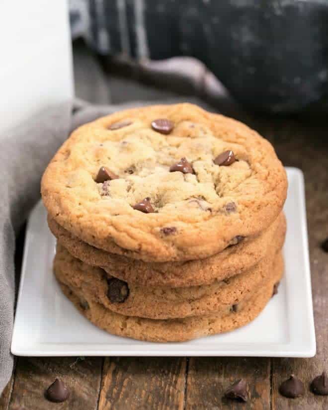  A stack of Thin Chewy Chocolate Chip Cookies on a square plate
