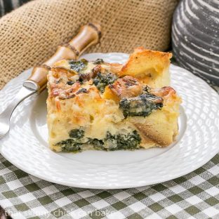 Gruyere Spinach Strata | A terrific cheesy breakfast casserole made with bread, French Gruyere and spinach!