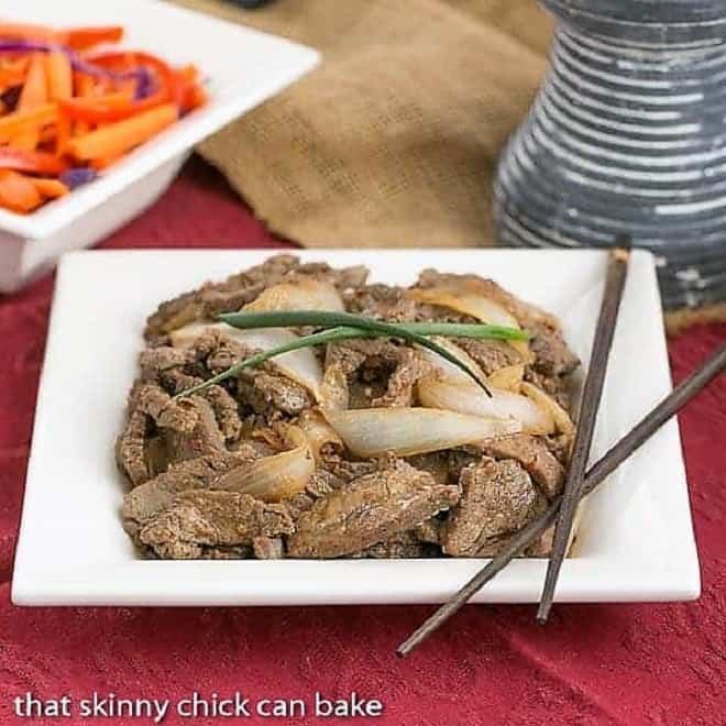 Square white plate of Beef Bulgogi.