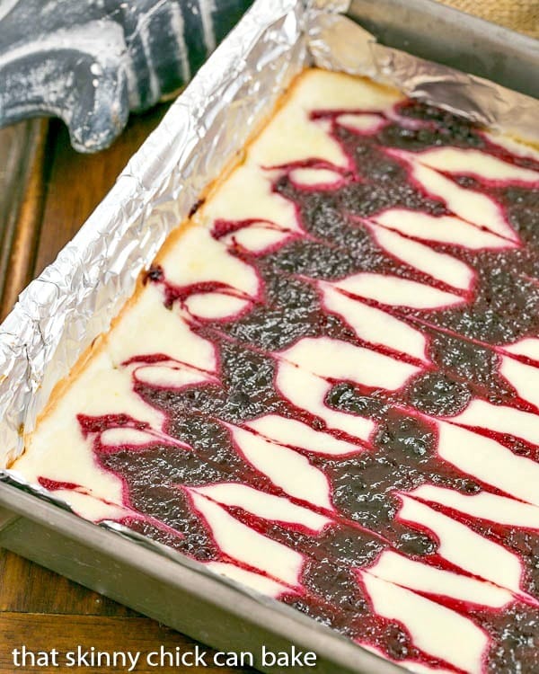 pan of swirled Blackberry Cheesecake Bars 