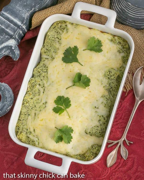 white casserole dish with Enchiladas Suizas 