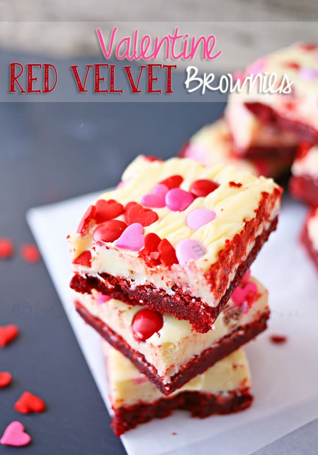A stack of frosted red velvet brownies