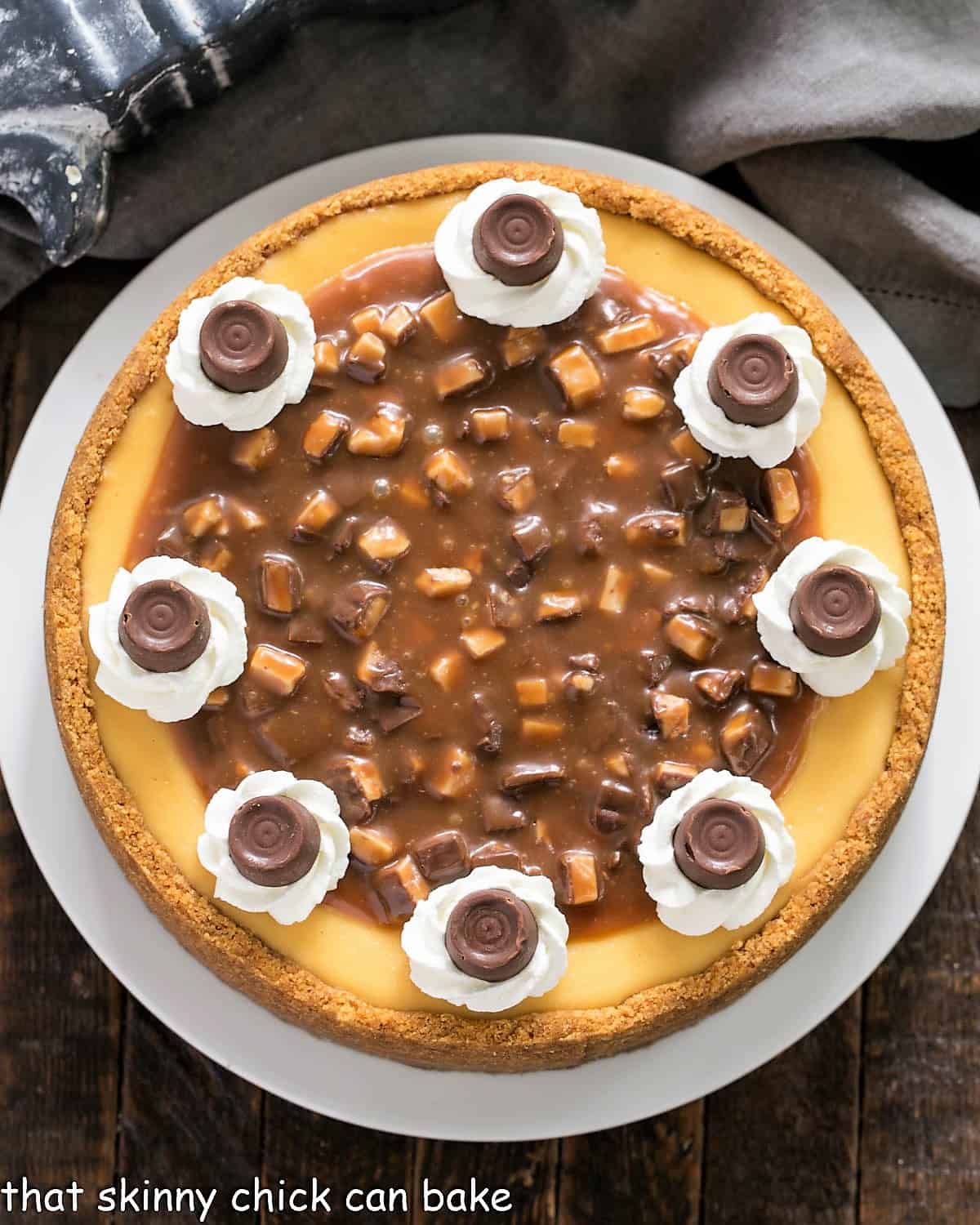 Overhead view of caramel cheesecake on a white plate