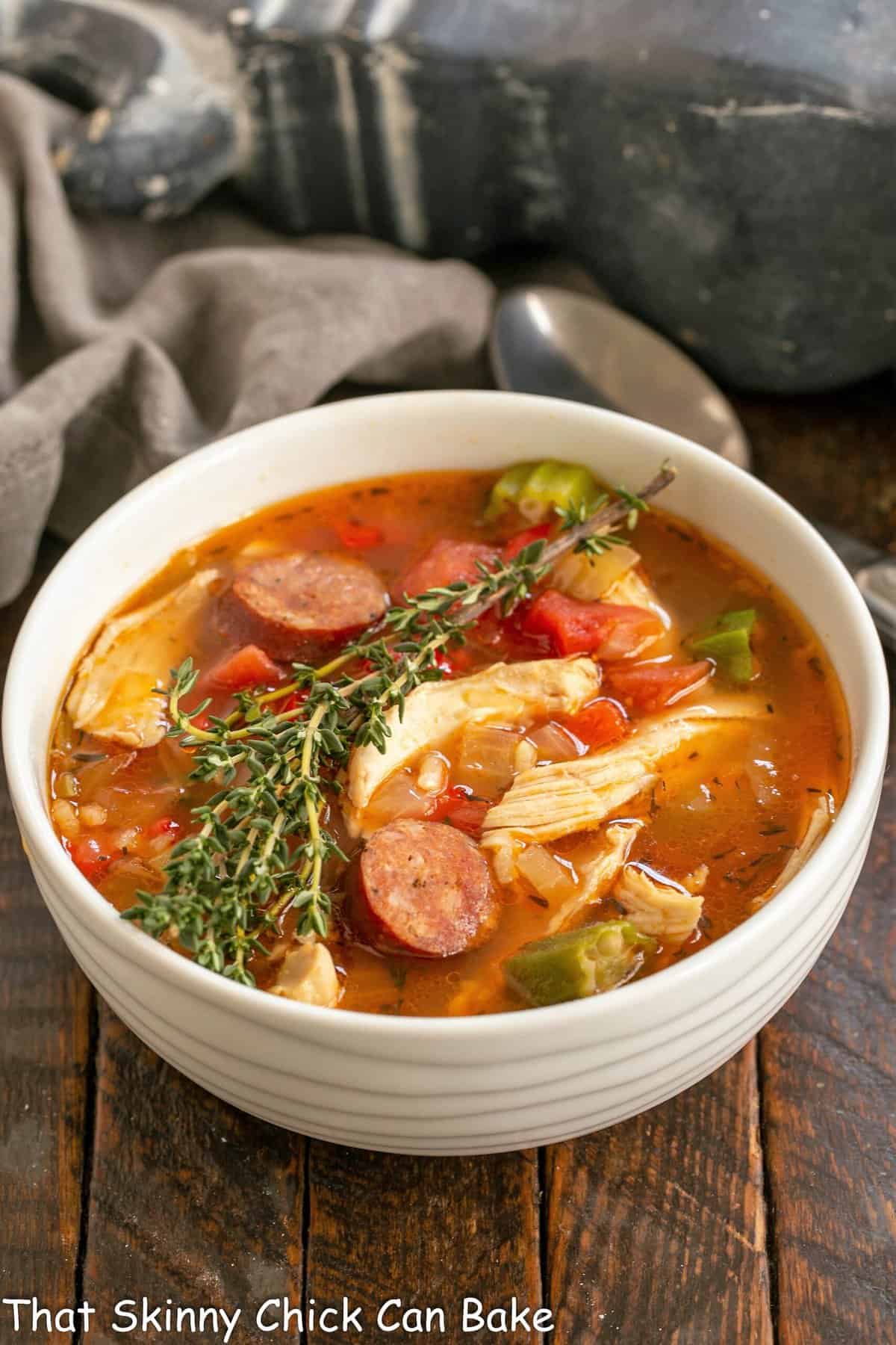 A bowl of chicken Jambalaya soup.