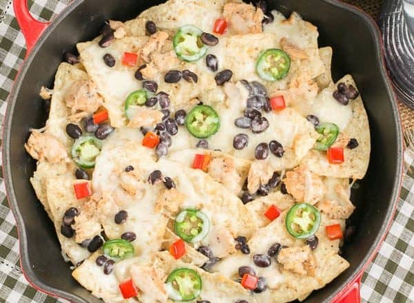 Spicy Salmon Nachos | Cheesy chips with jalapenos, black beans and salmon #ad