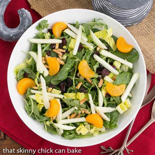 Overhead view of Holiday Lettuce Salad in a white bowl