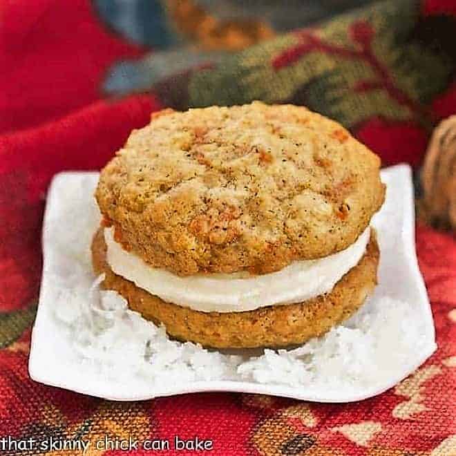 Carrot Cake Whoopie Pie sitting on a bed of flaked coconut.