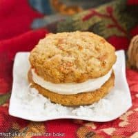 Carrot Cake Whoopie Pie sitting on a bed of flaked coconut