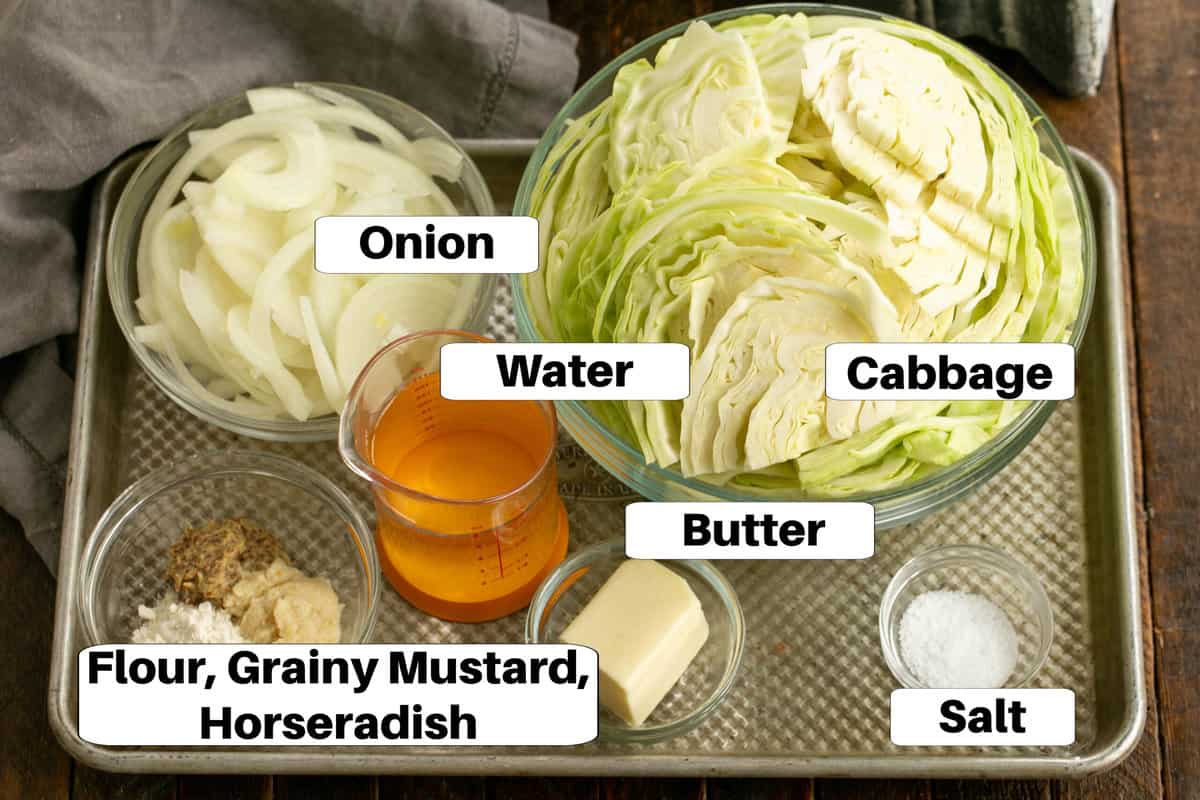 Sauteed Cabbage Ingredients on a sheet pan with labels.