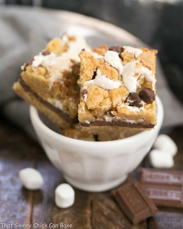 S'mores Cookie Bars - All the fabulous flavors of the classic campfire treat in a layered dessert!