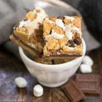 S'mores Cookie Bars - All the fabulous flavors of the classic campfire treat in a layered dessert!