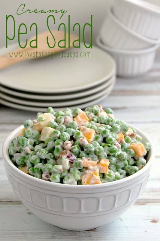 Pea salad in a white serving bowl