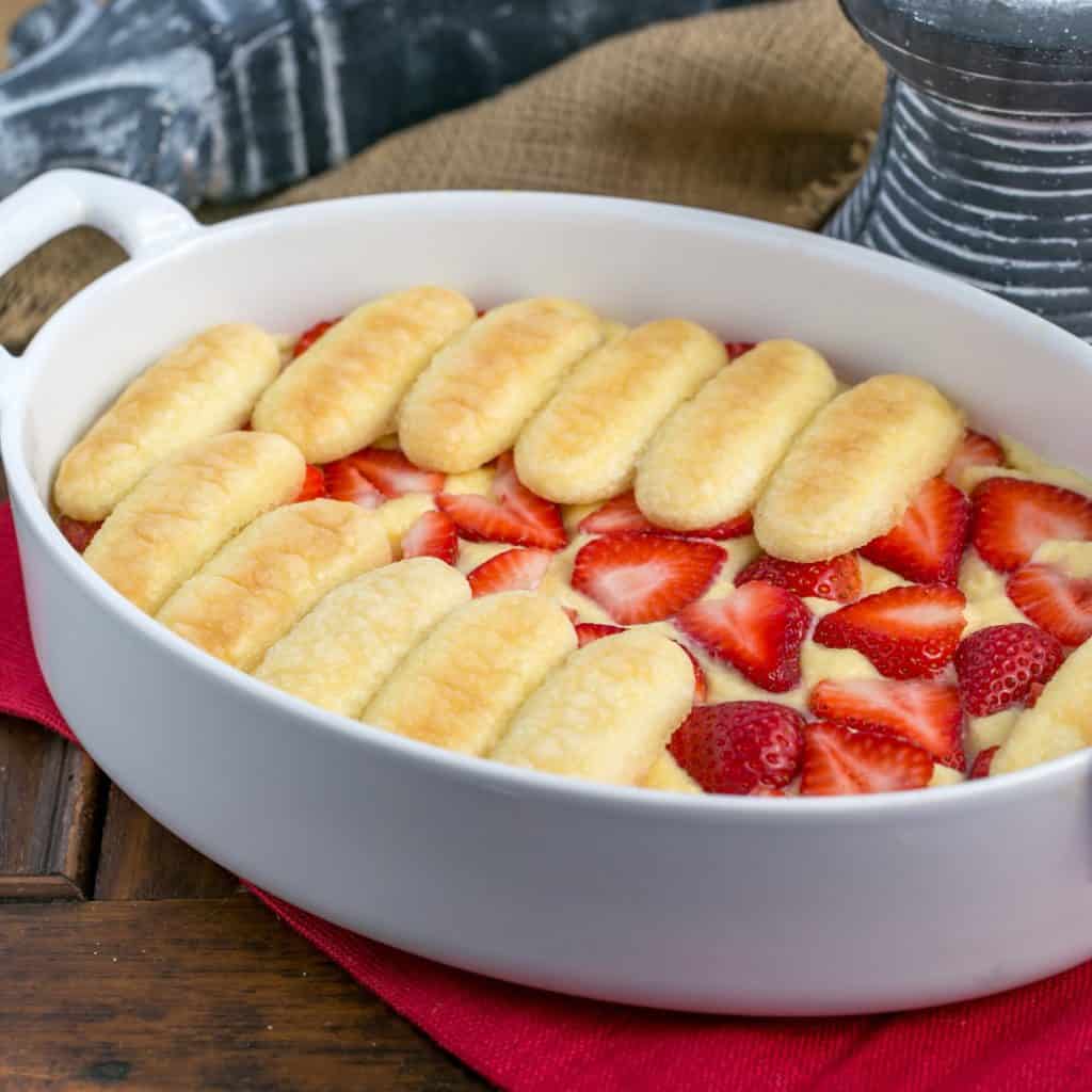 Berry Tiramisu with Grand Marnier in a white, oval baking dish