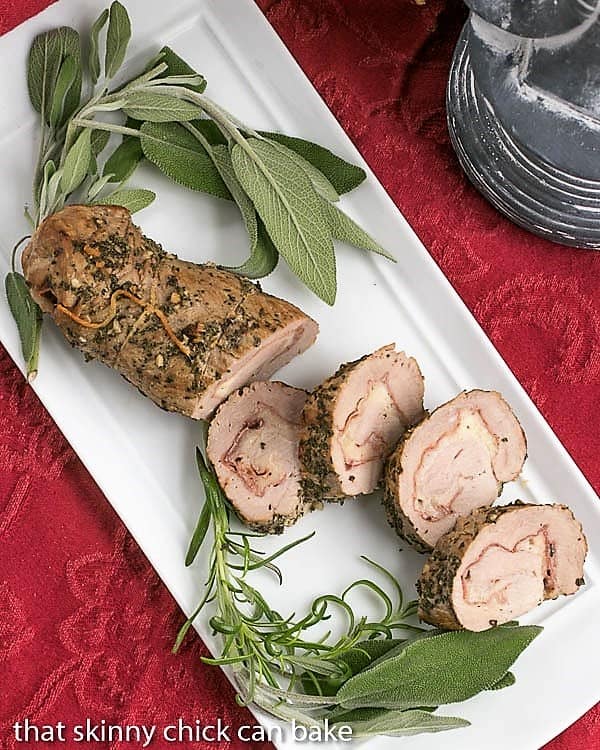 Overhead view ofProsciutto and Pork Pinwheels on a white tray