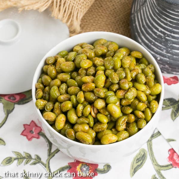 Roasted Creole Edamame in a white bowl viewed from above