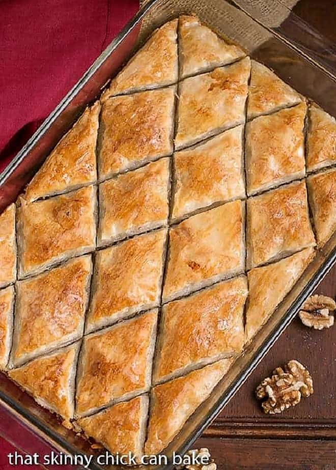 Overhead view of Classic Greek Baklava cut into diamond shapes in a glass 9x13-inch pan