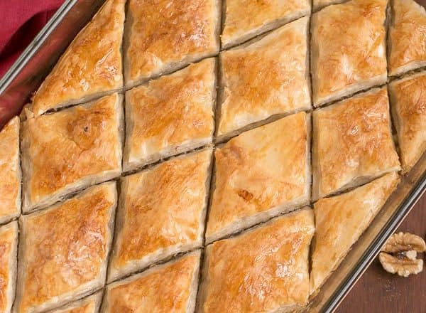 Gretchen's Baklava | My mom's baklava with layers of buttery filo & a walnut filling doused with orange blossom water kissed sugar syrup