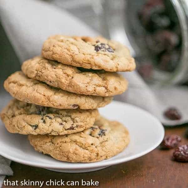 Oatmeal Chocolate Chunk Cookies stacked on a white saucer