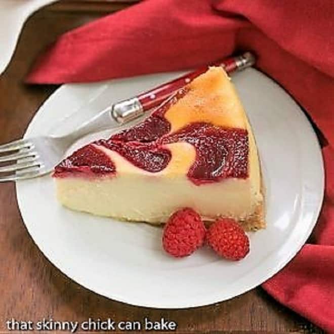 White Chocolate Raspberry Swirl Cheesecake - Elegant & Creamy - That Skinny Chick Can Bake