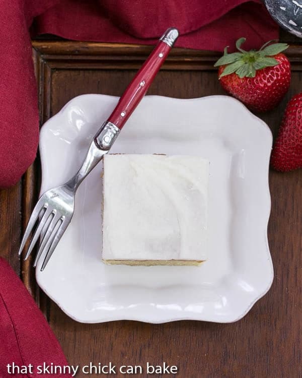 White Sheet Cake | Moist, tender with a touch of almond extract. Perfect when you need to serve a crowd!