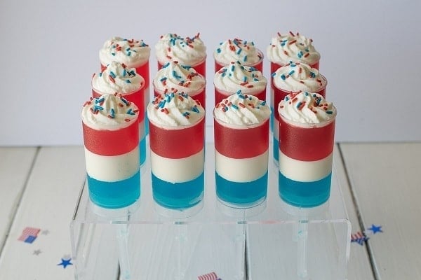 Patriotic Jello and Cream Push Pops in an acrylic stand