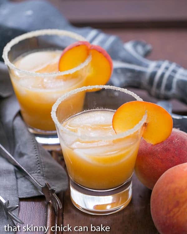 Two Peach Margaritas in highball glasses.