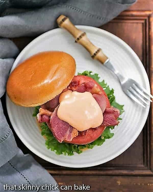 Overhead view of a BLT Burger with Spicy Mayonnaise. 