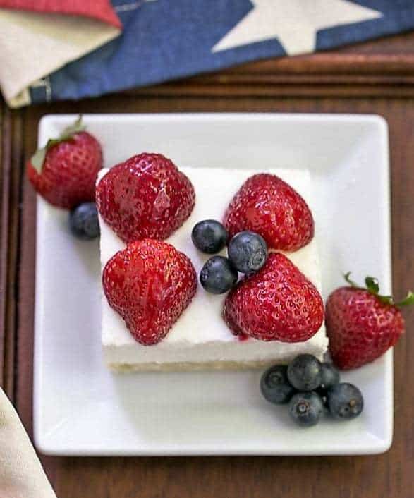 Berry Cheesecake Flag Dessert slice on a white square plate