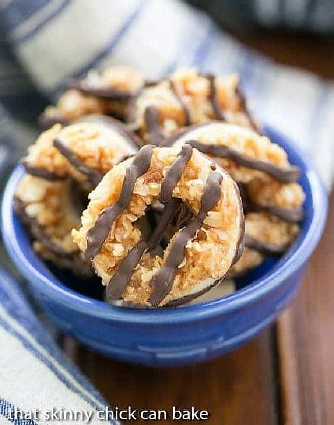 The BEST Homemade Samoa Cookies - These exquisite creations are heads and tails better than the originals! Homemade Samoas Cookies in a blue bowl.