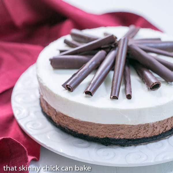 Triple Chocolate Mousse Pie on a white serving plate with a red napkin.