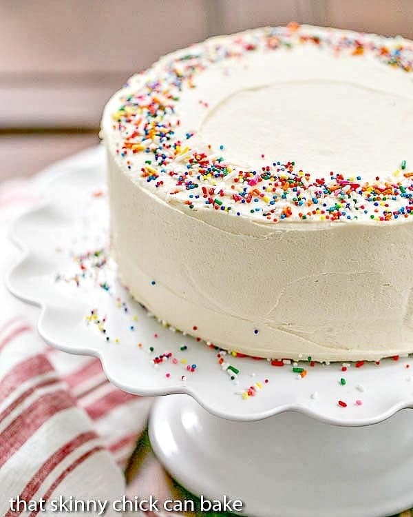 Funfetti Cake on a ruffled white cake stand
