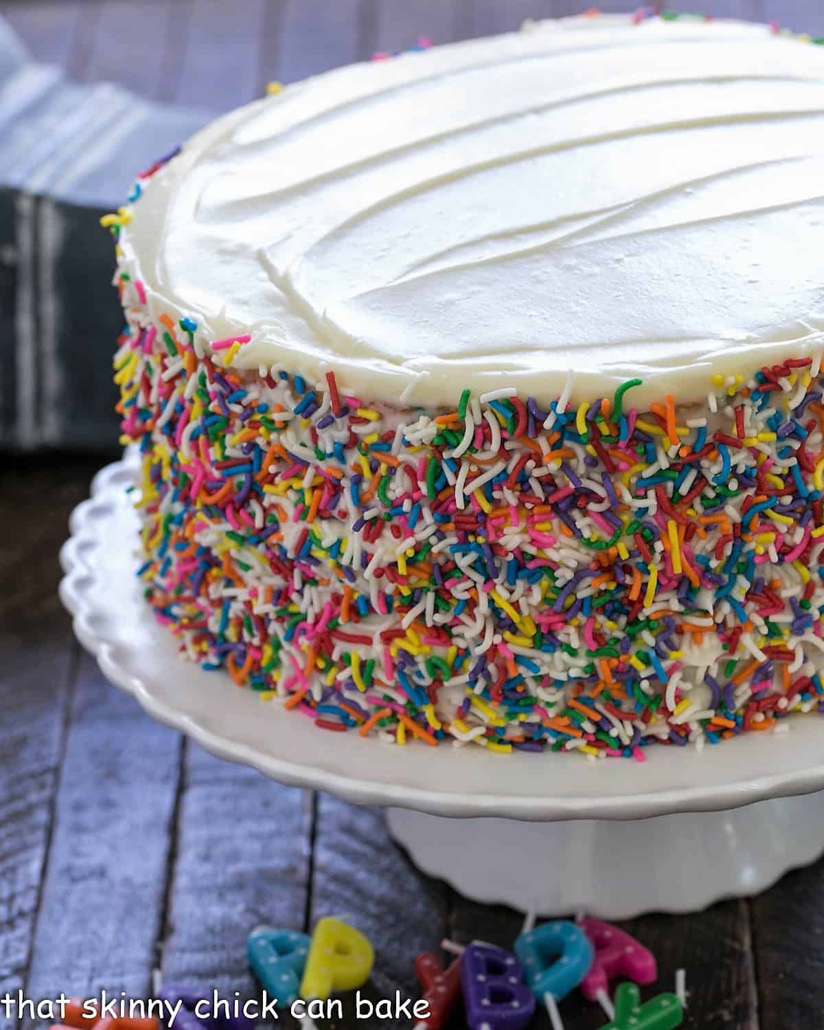 Confetti Cake on a white cake stand