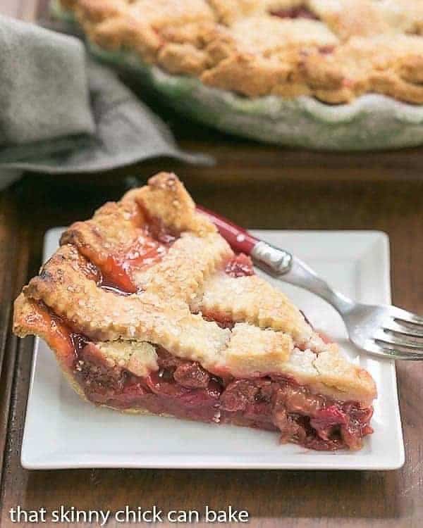 Slice of Classic Rhubarb Pie on a square white dessert plate.