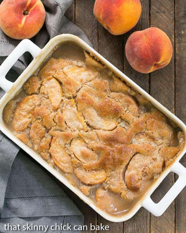 Fresh Peach Pudding in a white rectangular casserole dish