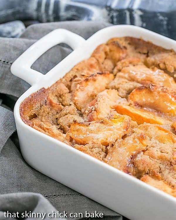 Fresh Peach Pudding partial view in a white ceramic casserole