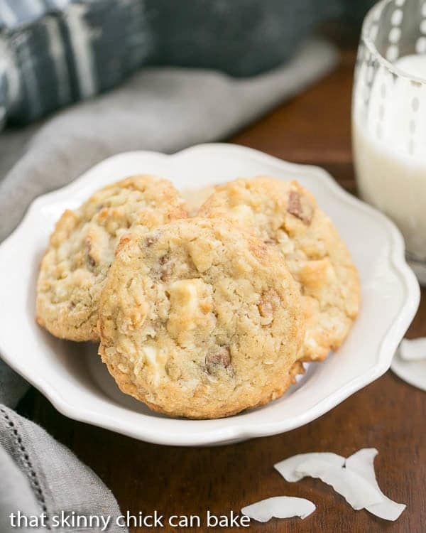 White Chocolate Toffee Chunk Cookies in a white ceramic bowl