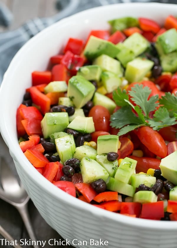 Close view of Fiesta Salad garnished with a sprig of cilantro