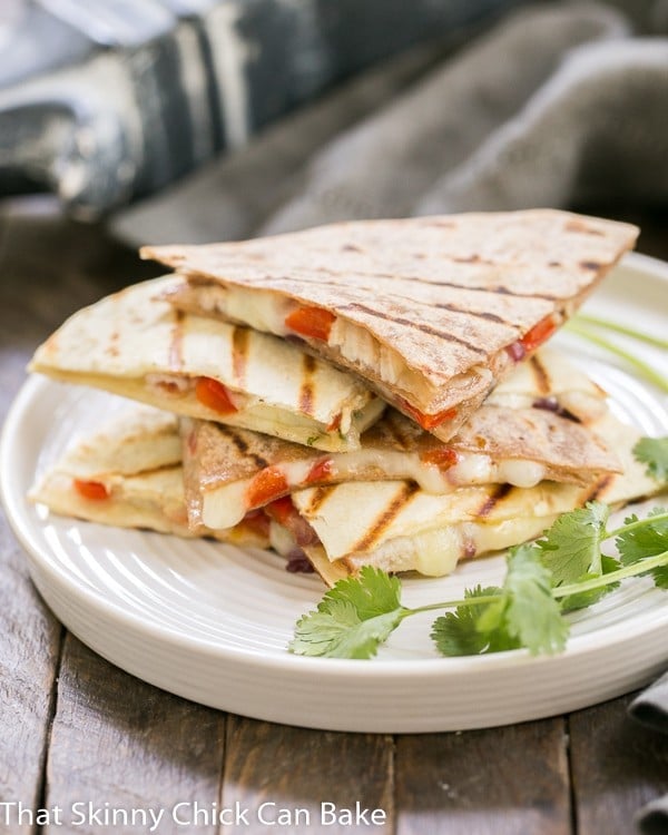 Spicy Pork Quesadillas An easy Tex-Mex dish that's perfect for a weeknight dinner, game day snacking and more!