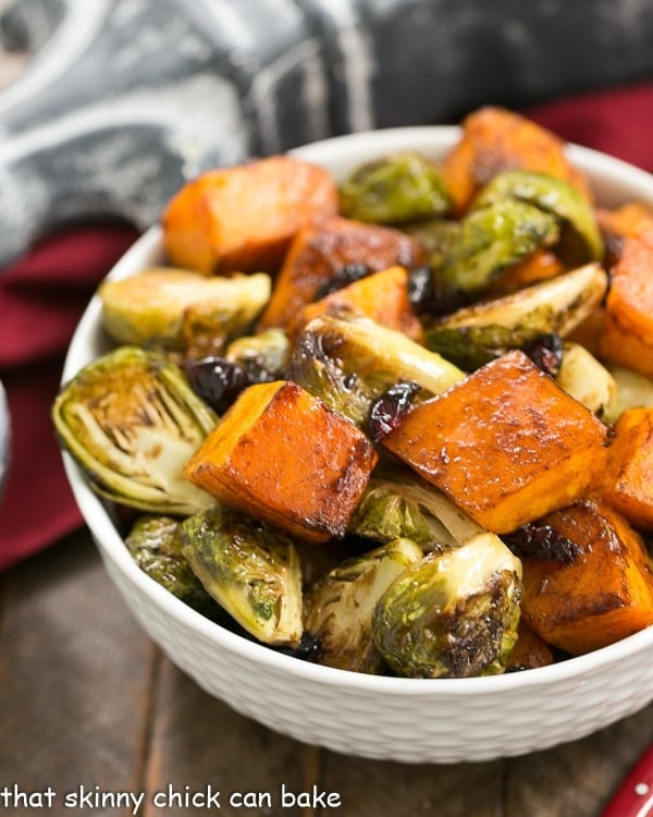 Roasted Autumn Vegetables in a white basketweave bowl.