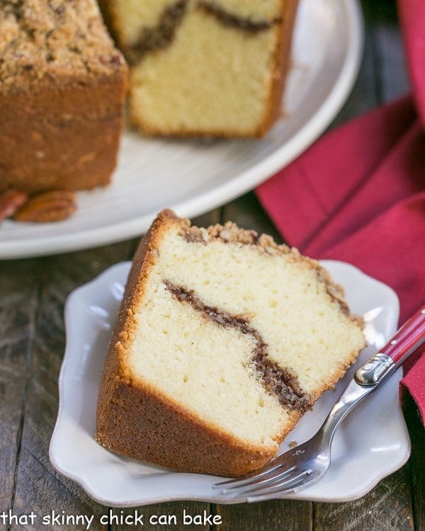 Slice of pound cake recipe on a square white plate.