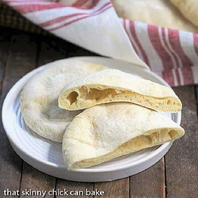 Homemade Flatbread Bread on a round white plate.