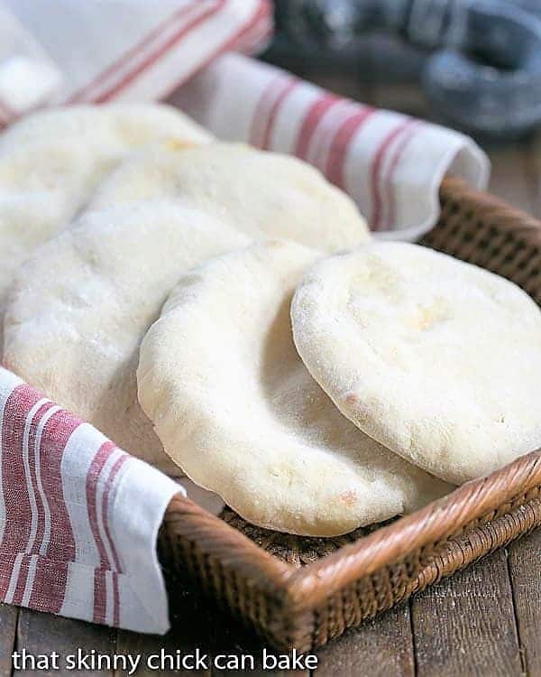 Homemade Pocket Bread in a wicker basket.