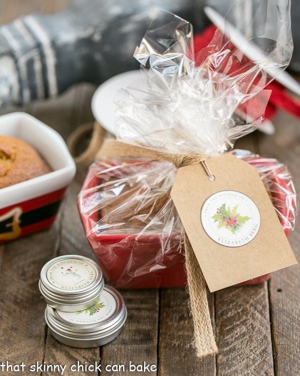 Mini Pumpkin Breads wrapped in cellophane with a festive gift card.