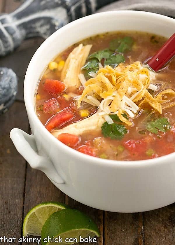 Leftover Turkey Tortilla Soup in a white terrine.